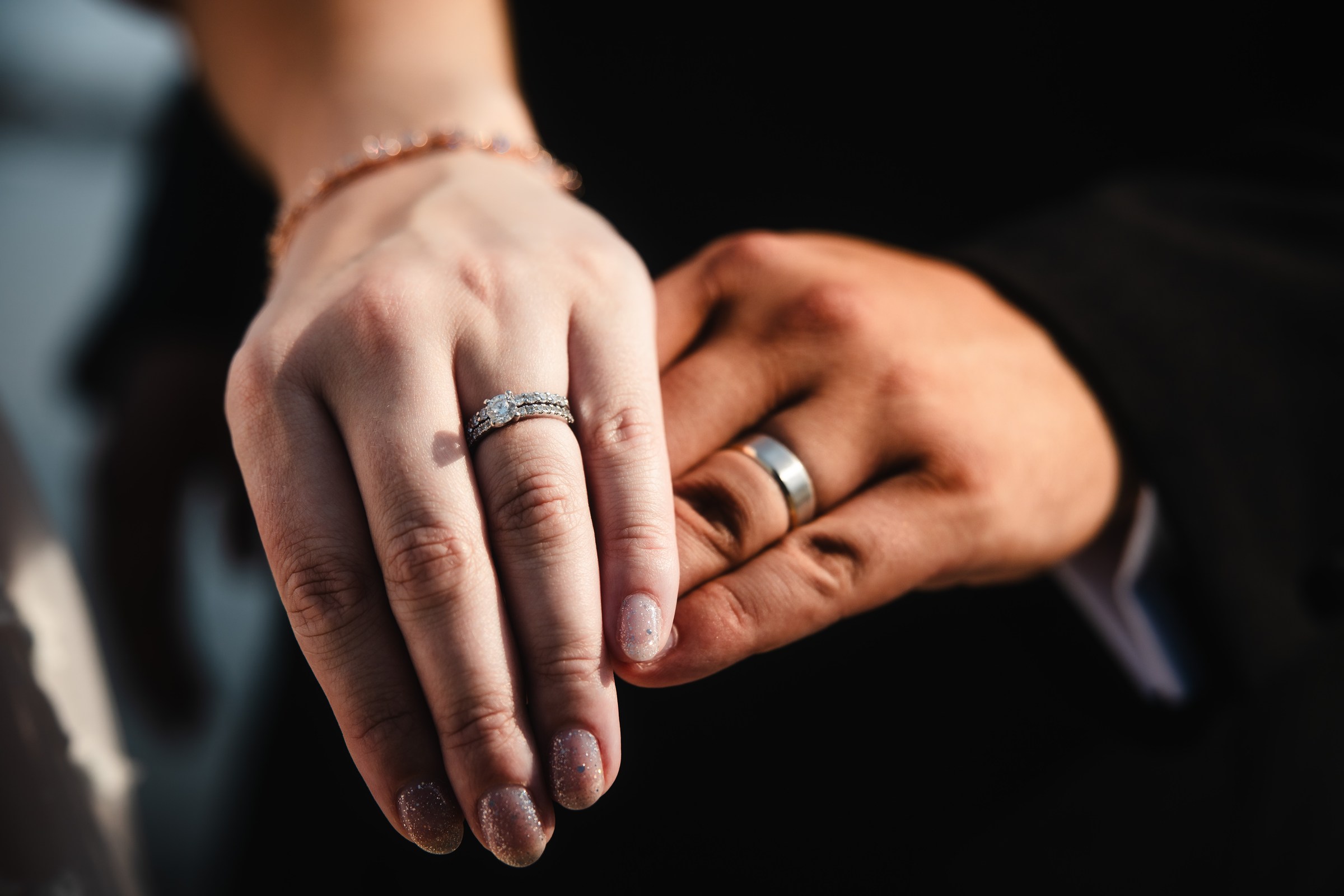 Wedding rings and personal details photographed close up