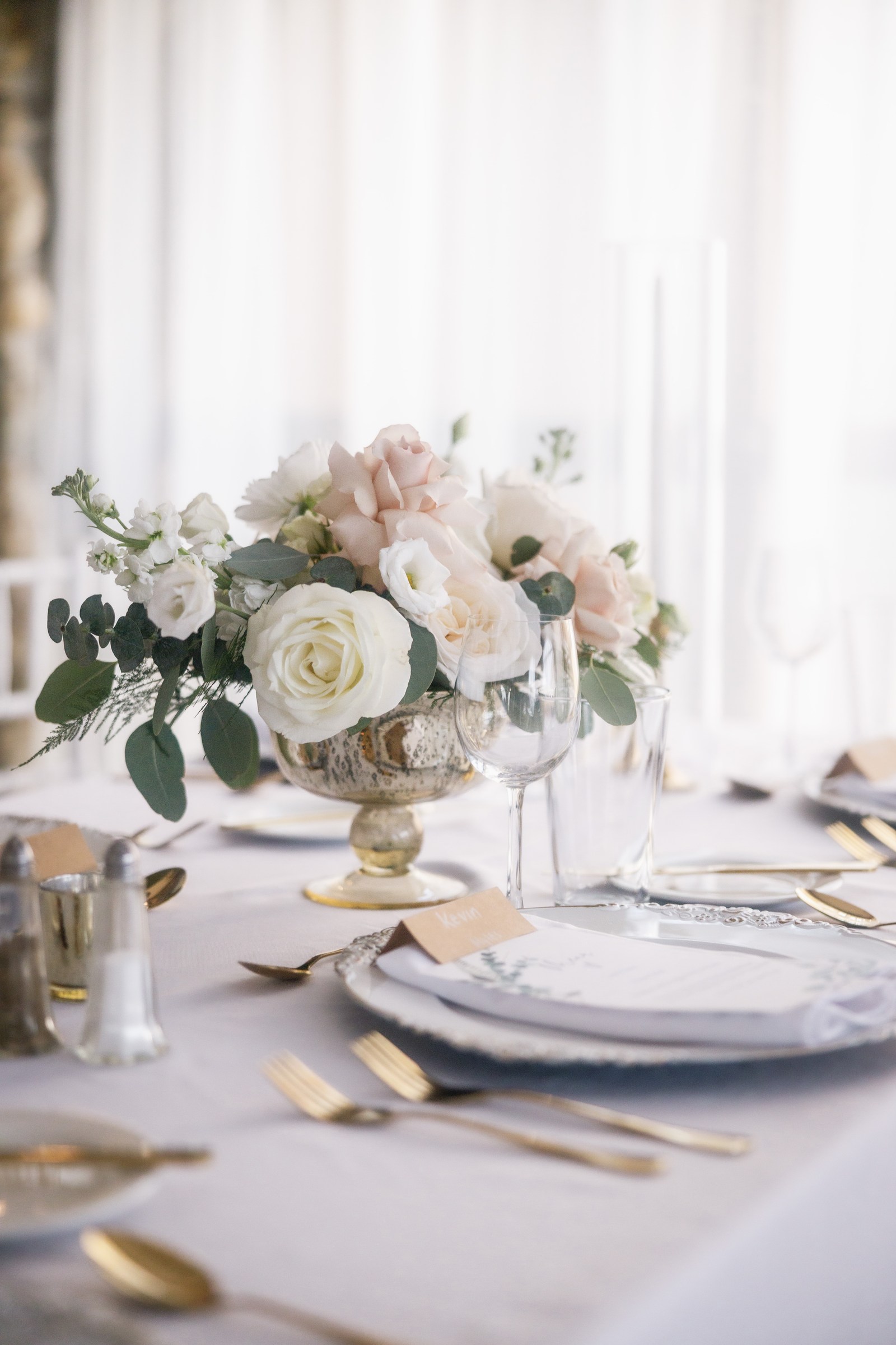 Elegant floral details on a wedding reception table